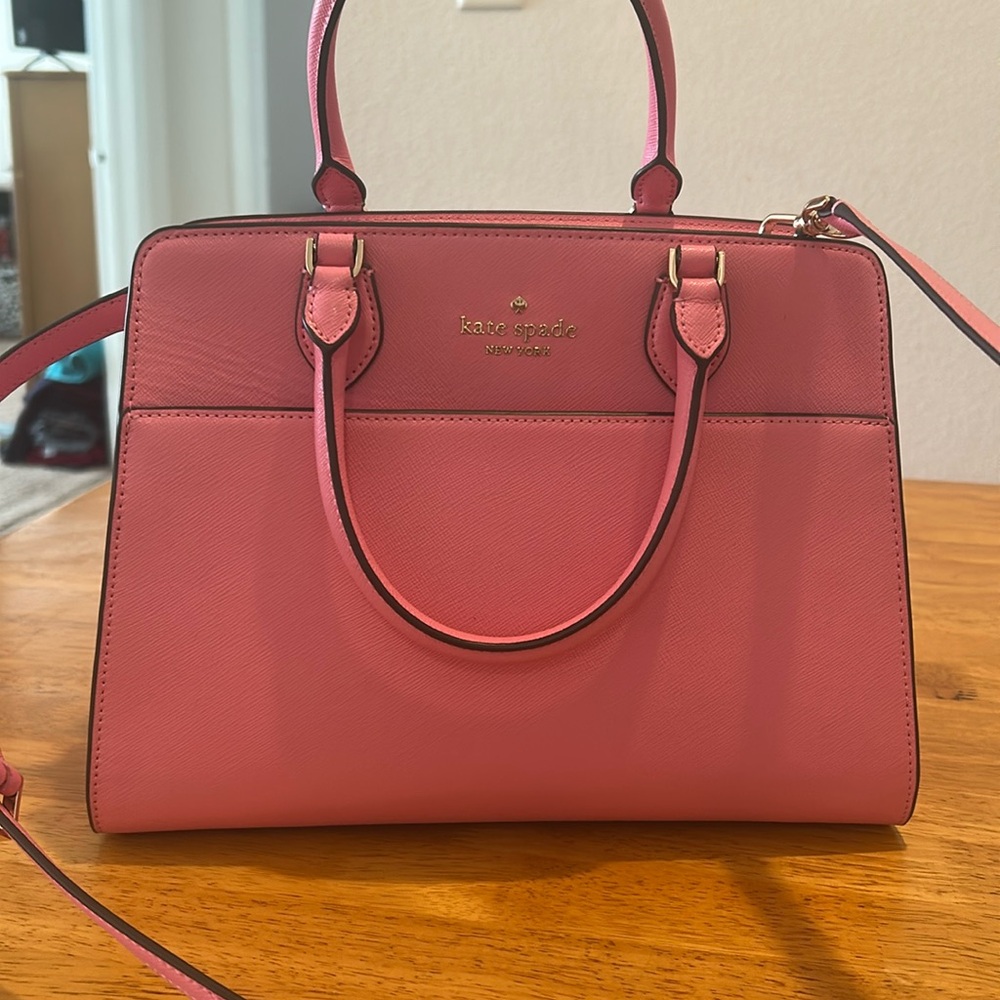 Kate Spade purse with shoulder strap.